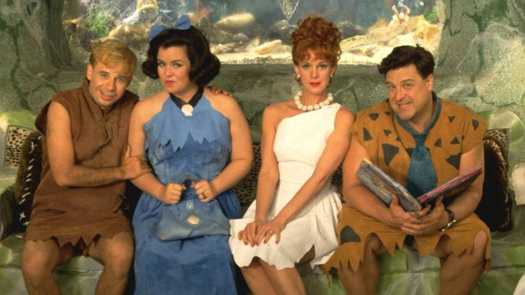 Atores do filme os Flintstones interpretando Barney, Betty, Wilma e Fred