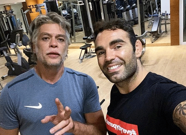 Foto mostra o treinador Chico Salgado com Fábio Assunção
