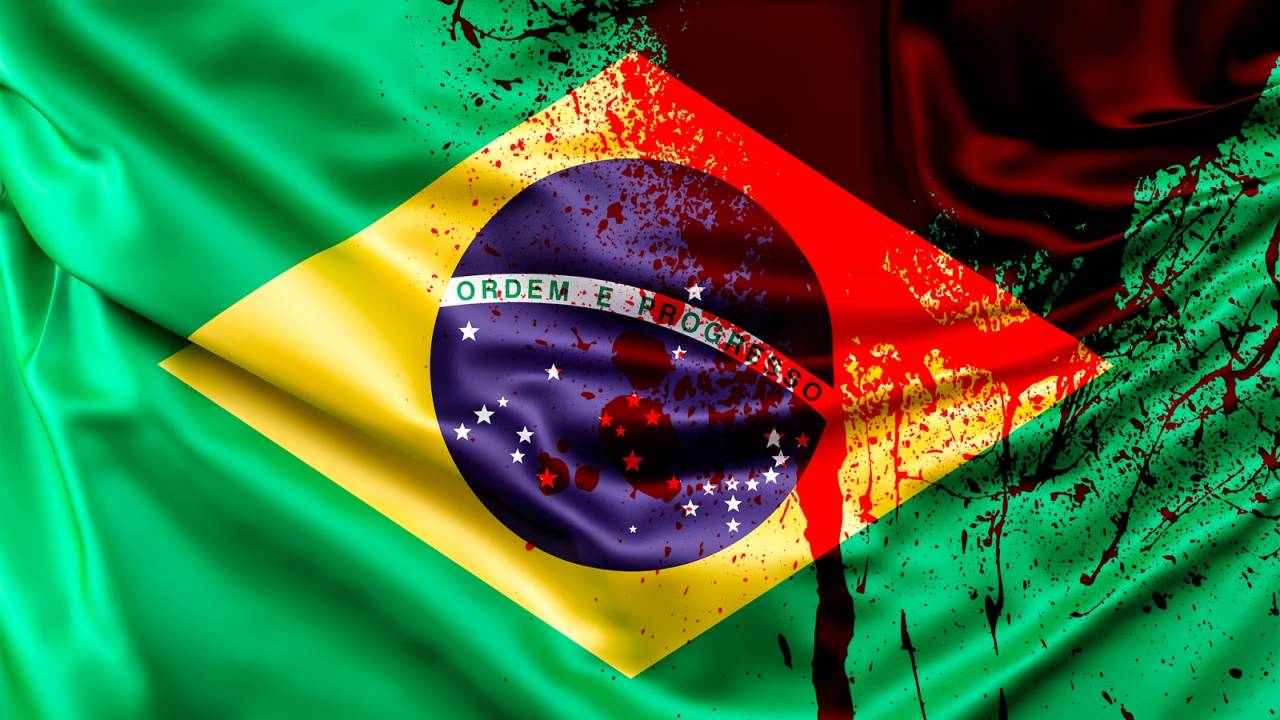 Bandeira do Brasil manchada de sangue.