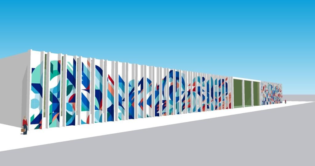 Foto mostra área externa da Biblioteca Parque pintada com cores e formas geométricas