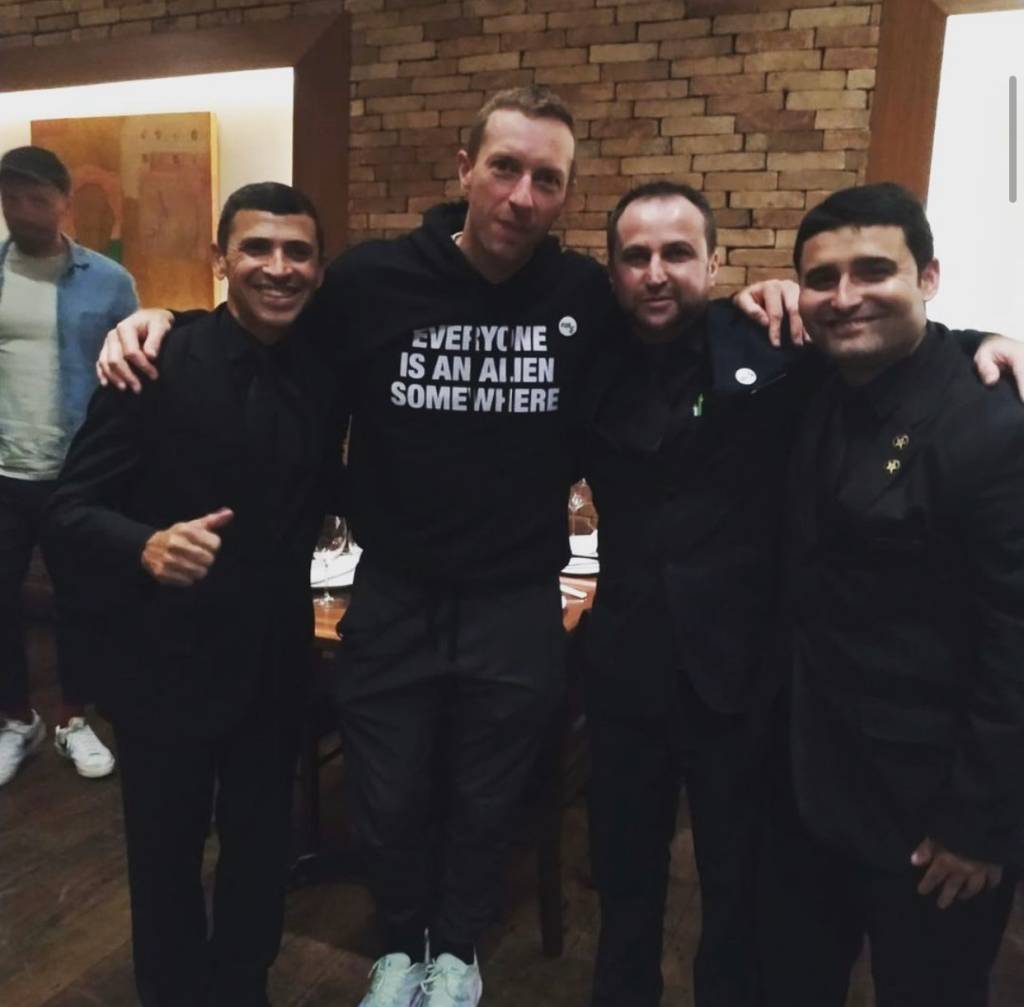 Coldplay: Chris Martins tirou fotos com os garçons do Giuseppe Grill