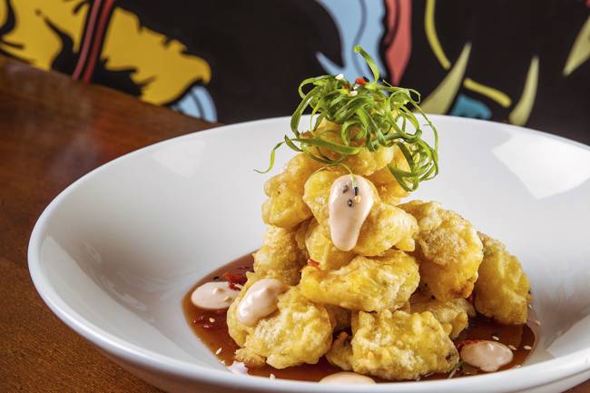 Fusão Peru-China no RioSul: gato da sorte gigante dá boas vindas ao Cantón