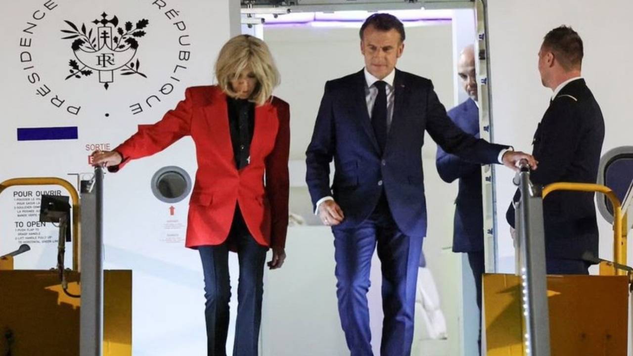 Vídeo mostra primeira-dama empurrando rosto de Macron