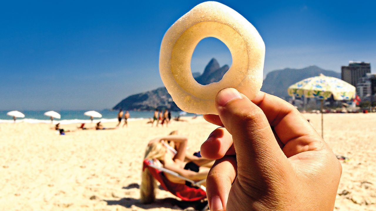 Playing with fried froth on the beach.