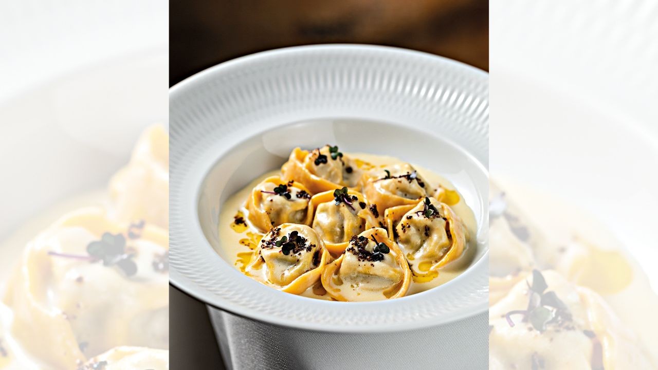 Nido -Tortello ricotta e espinafre com gema e trufa – foto Rodrigo Azevedo (3).jpg